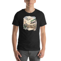 Mockup of a unisex graphic T-shirt featuring a vintage-style Syria-inspired artwork with Arabic calligraphy, historic architecture, scenic landscape, and the Syrian flag.