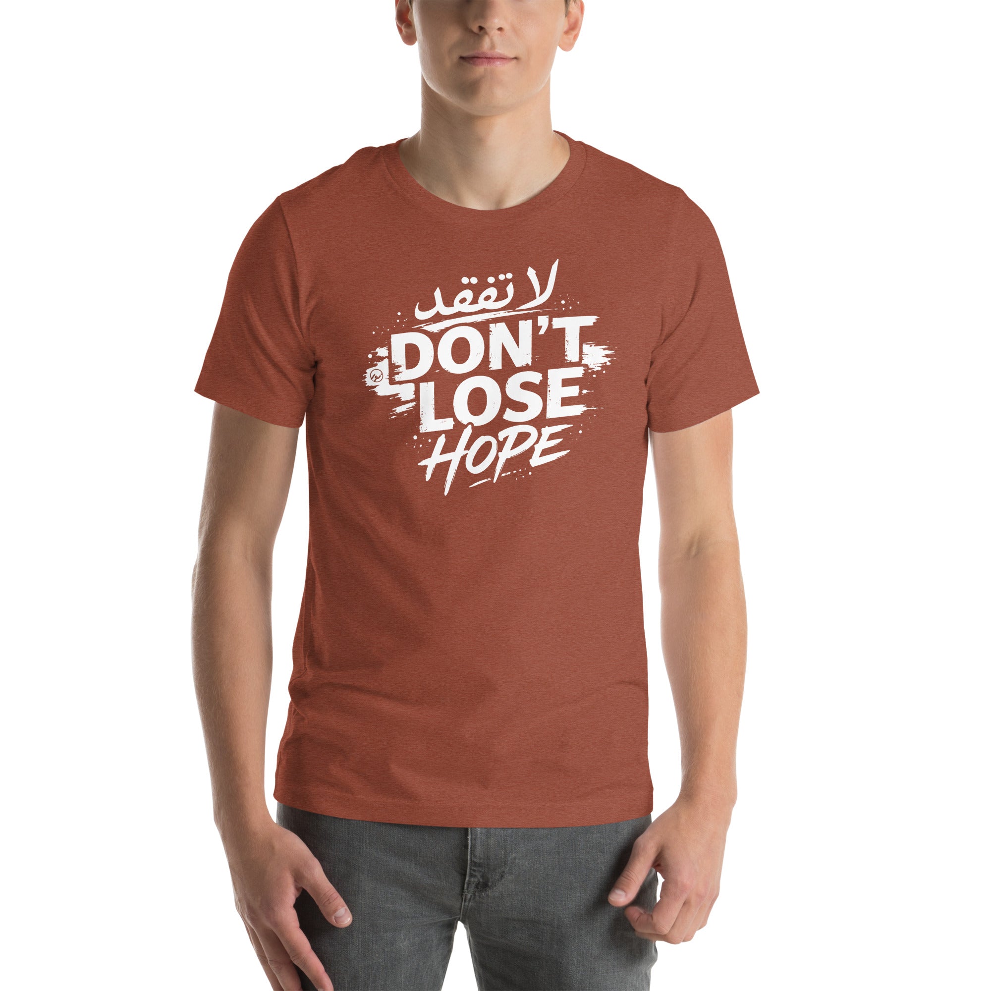 Unisex graphic T-shirt with "Don't Lose Hope" motivational design in Arabic and English.