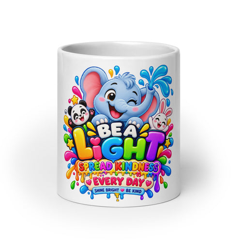 White ceramic mug featuring a colorful “BE A LIGHT” design with cute elephant, panda, and bunny characters and the message “SPREAD KINDNESS EVERY DAY.”